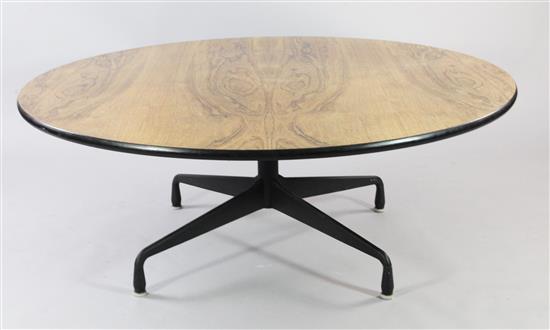 A Herman Miller low circular rosewood top table, in the manner of George Nelson, W.4ft 6in. H.1ft 8in.